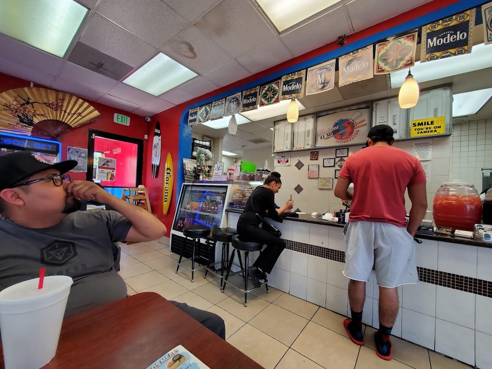 A lively restaurant interior with counter service.